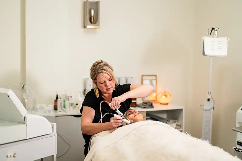 A client prepares for her skincare treatment at a facial spa in Flower Mound, TX.